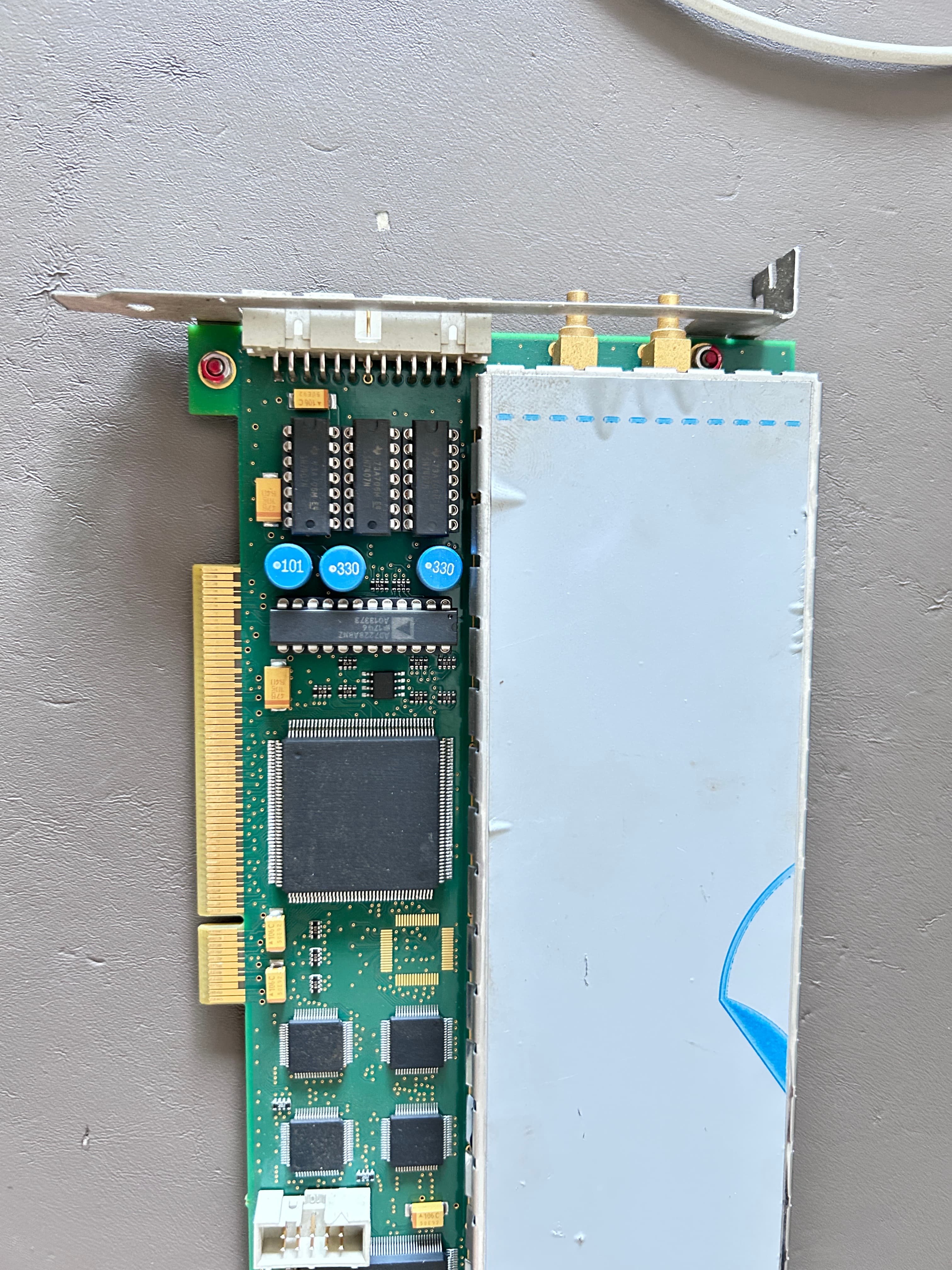 USPC 7100 LA PCI Card Connectors and Capacitors Close-up