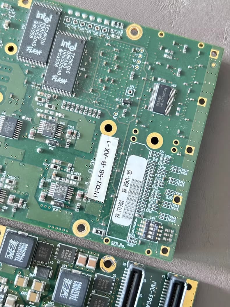 Close-up of Intel Flash memory chips on PMC-FPGA03